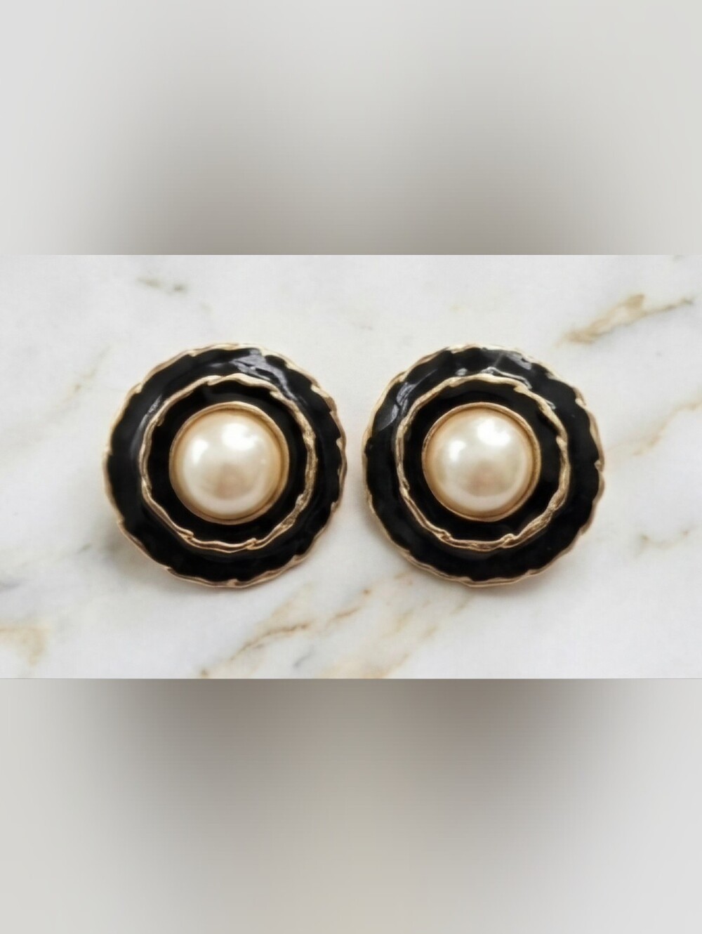Vintage 1980's with pearl cabachons and black enamel.